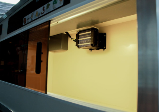 Brooder Enclosure Internal View Showing Light and Heat Array